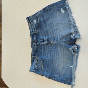 Loft cut-off medium wash denim shorts. Size 12/31.